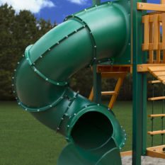 A green play structure with a slide.
