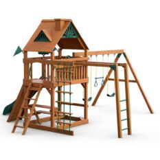 A wooden play set with a slide and swings.