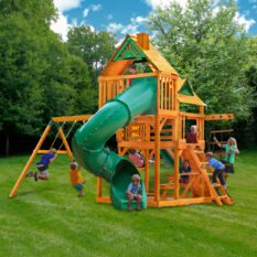 A GREAT SKYE I swing set with a green slide.