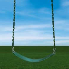 A Deluxe Swing Belt hanging on a chain in a grassy field.
