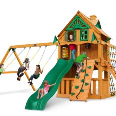 A Horizon Clubhouse Treehouse w/ Fort Add-On Swing Set with a slide and swings.