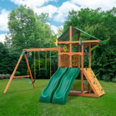 An OUTING SWING SET with a green slide.