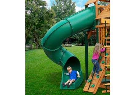 Child sliding on a twisted spiral slide