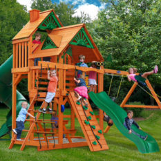 A children's GREAT SKYE I SWING SET with a slide and swings.