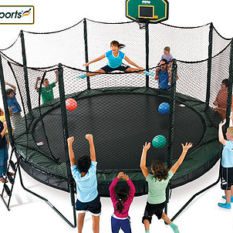 A group of children playing on a Power Double Bounce Trampoline.