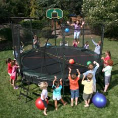 A group of kids playing on Hoppy Balls.