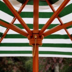 A close up of a Children's Picnic Table with Shade Umbrella.