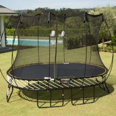 A SpringFree Medium Oval Smart Trampoline on a grassy area.