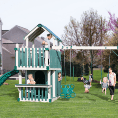 A family is playing on a VinylNation Bright Star Swing Set in the yard.