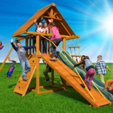 A group of kids playing on a Dreamscape Outdoor Swing Set.
